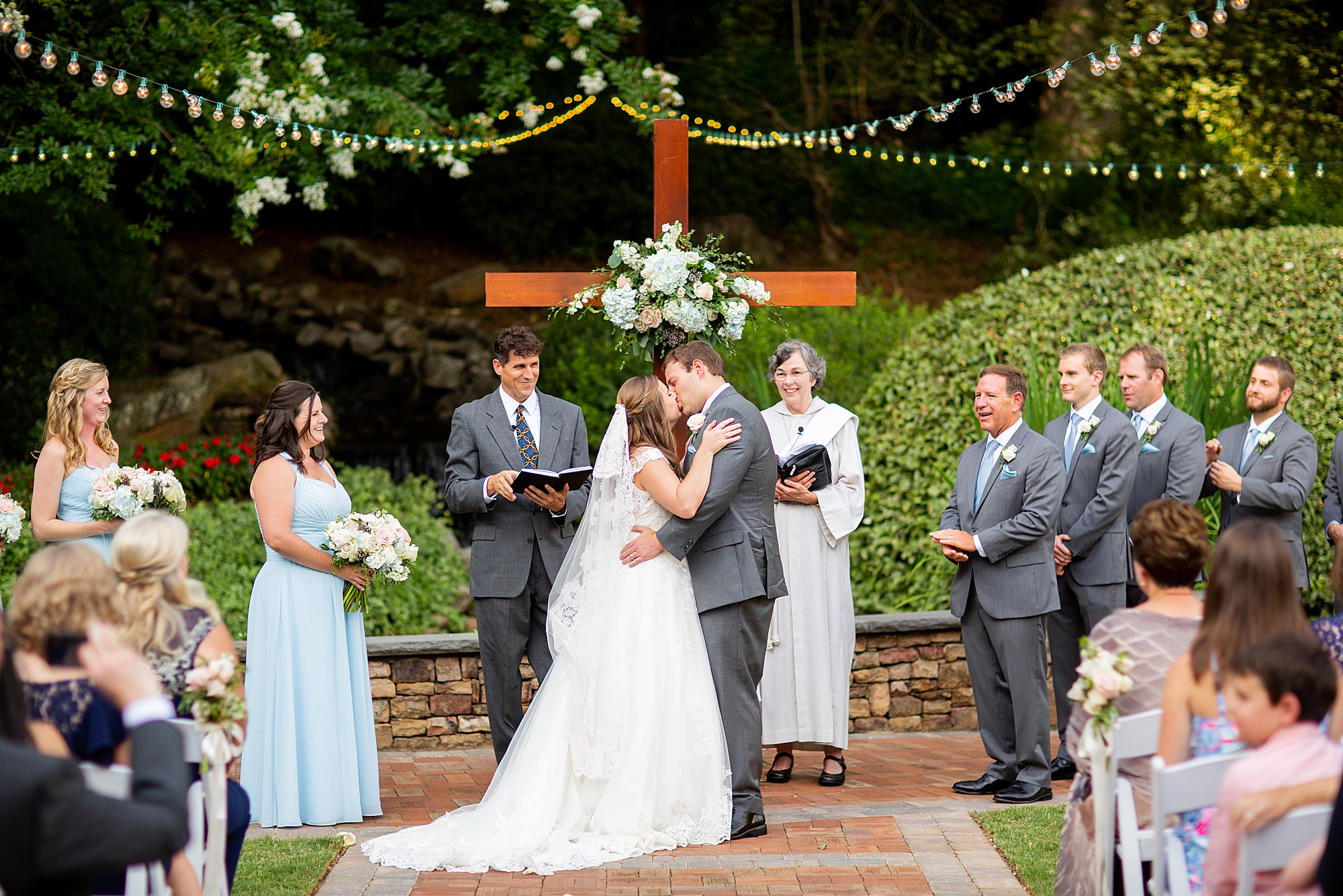 outdoor wedding first kiss