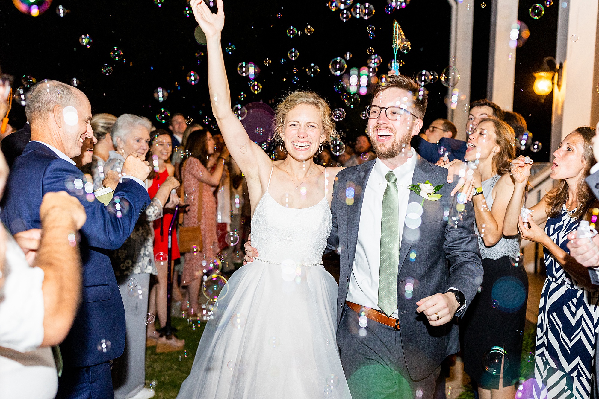 Eleanor Stenner Photography - a Birmingham, AL wedding photographer - photographs the Holland's grand exit 