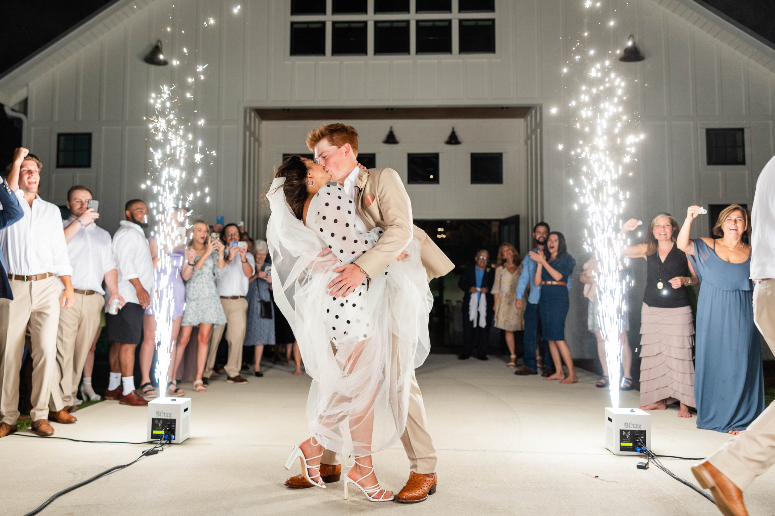 Eleanor Stenner Photography - a Birmingham, AL wedding photographer - photographs the Langner's grand exit 