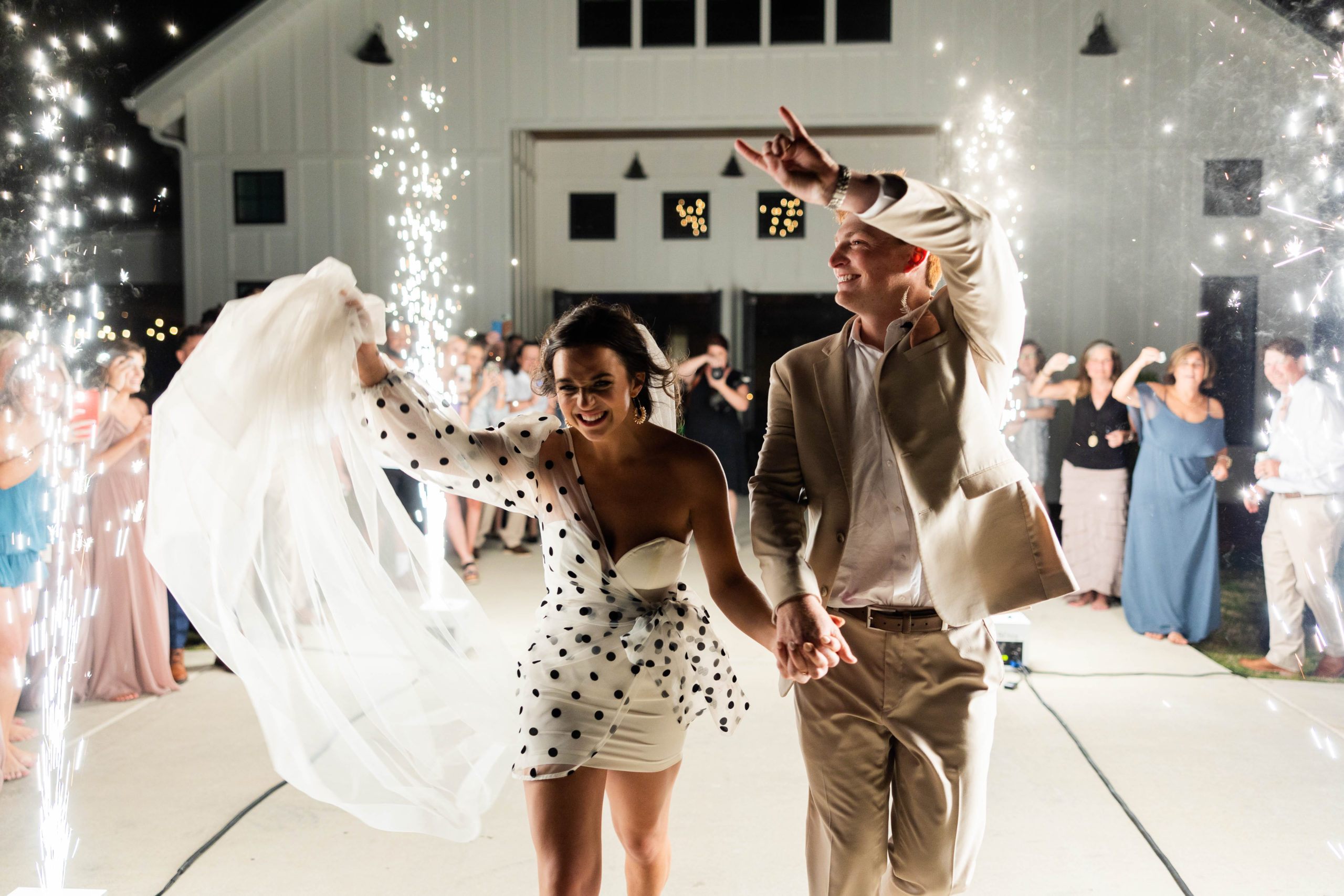 Eleanor Stenner Photography - a Birmingham, AL wedding photographer - photographs the Langner's grand exit 